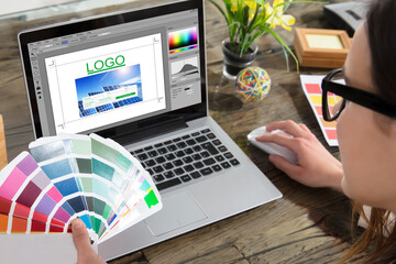 Poster - Business Woman Making Color Selection For Logo Design