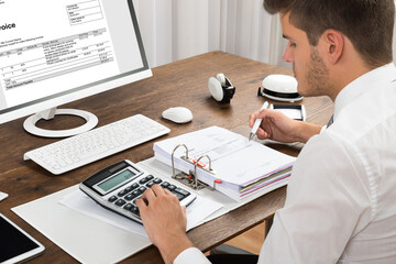 Poster - Accountant Calculating Tax At Desk