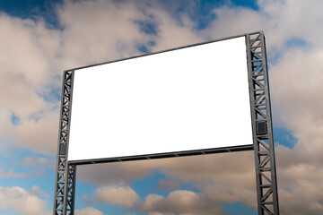 Wall Mural - mock up: blank white billboard or large display against the blue sky with white clouds. marketing, o