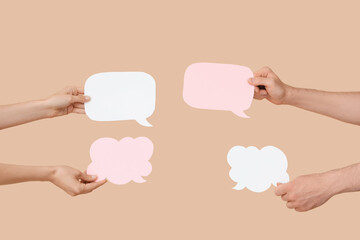 Sticker - Different hands with speech bubbles on beige background