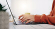 © Wesley/peopleimages.com - Closeup, hands and woman with laptop, typing and planning for new project, deadline and creativity. Zoom, female entrepreneur and lady with device, keyboard or schedule with inspiration or motivation