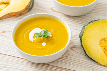 Canvas Print - pumpkin soup in white bowl