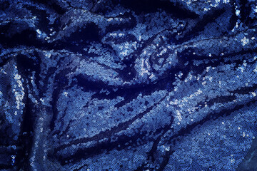 background of beautiful dark blue sequins fabric