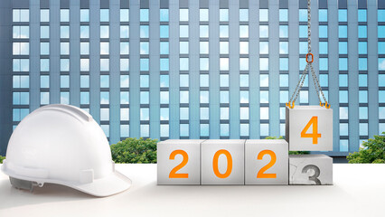 Wall Mural - The year 2024 in the concrete cube. The construction crane is lifting the new number 4 to replace the old number 3. for success in real estate construction