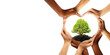 Earth day and earth day as group of diverse people joining to form heart hands connected together protecting the environment and promoting conservation and climate change issues as an image. PNG file.