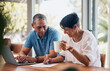 © Mumtaaz D/peopleimages.com - Senior couple, documents and planning for home, investment or budget, retirement or pension on laptop. Elderly woman and man signature on paper for asset management, loan agreement or life insurance