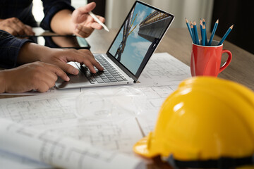 Poster - Man, architect, and engineer work discussing tools and construction concepts on a building site with blueprints for a professional construction job and building contractor development.
