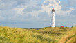 © mpix-foto - Ein Leuchtturm in den Dünen am Meer