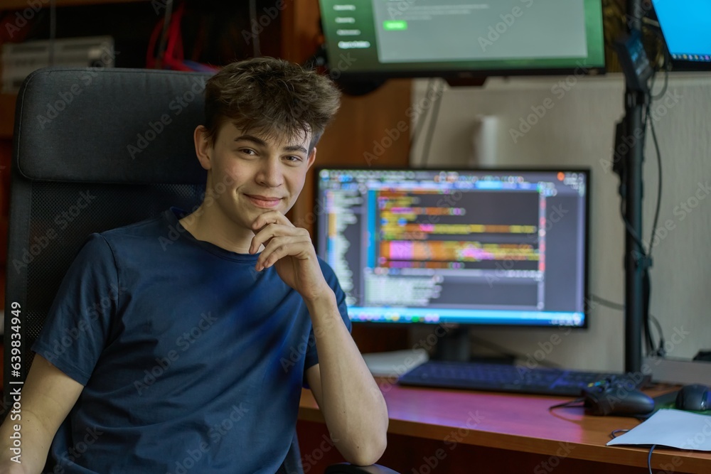 Young student learning computer science, coding, programming, IT ...