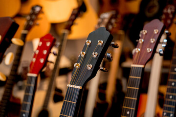 Wall Mural - Many rows of classical guitars in the music shop