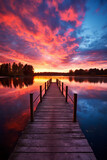 Fototapeta Las - Relaxing moment: Wooden pier on a lake with an amazing sunset