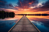 Fototapeta Pomosty - Relaxing moment: Wooden pier on a lake with an amazing sunset