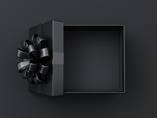 Wall Mural - Blank open black present box or top view of opened black gift box with black ribbons and bow isolated on dark background with shadow minimal black friday sale concept 3D rendering