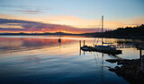 Fototapeta Góry - sailboat in Halfmoon Bay. sunset over the sea. Sunshine Coast, British Columbia, Canada