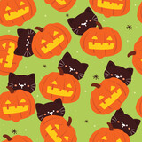 Fototapeta Pokój dzieciecy - Halloween seamless pattern with cartoon pumpkin, cat, ghost, and halloween element. cute halloween wallpaper for holiday theme, gift wrap paper