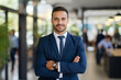 © AspctStyle - Confident male corporate leader executive manager wearing casual wear posing for business portrait. Portrait of happy handsome professional businessman smiling looking at camera standing in office