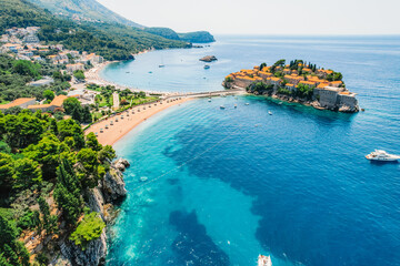 Beautiful beach and Sveti Stefan island near Budva, Montenegro. Luxury resort at Adriatic sea.