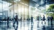 © Fred - Blurred business people meeting in modern glass office building