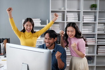 Poster - Group of Young Asian business team creative businesspeople coworker in office Happy to be successful partnership teamwork celebrating achievement and success concept.