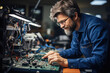 © evannovostro - Microelectronic engineer works with a hardware parts
