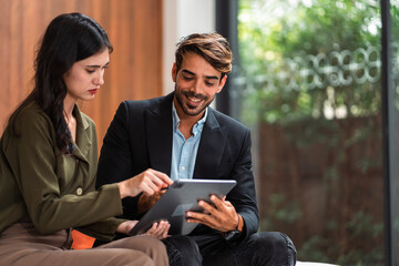 Wall Mural - Male mature caucasian ceo businessman leader with diverse coworkers team executive managers group meeting. Multicultural professional businesspeople working together on research plan boardroom.