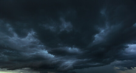 Aufkleber - The dark sky with heavy clouds converging and a violent storm before the rain.Bad or moody weather sky and environment. carbon dioxide emissions, greenhouse effect, global warming, climate change.