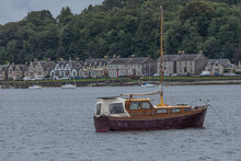 Scruffy Old Sailing Boat Moored In A Bay