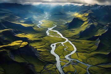 Wall Mural - aerial shot of winding river deltas and canyons from a helicopter or drone, stunning scenic world la