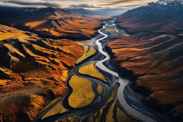 Wall Mural - aerial shot of winding river deltas and canyons from a helicopter or drone, stunning scenic world la