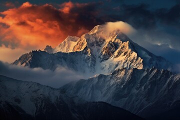 Wall Mural - Snow covered mountain peak close-up at sunrise or sunset, Stunning Scenic World Landscape Wallpaper Background