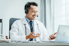 Young Male Asian People Doctor In Telemedicine, Video Conference, Video Call, Online Doctor Available Telehealth Services Provide Online Medical Care For Urgent Care, Mental Health, And Therapy.
