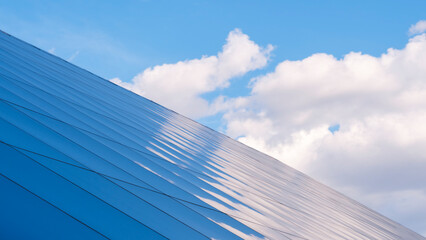 Poster - Close-Up Of Modern Office Buildings, dawn sunset with clouds reflected in the windows