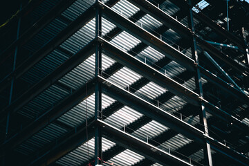 Wall Mural - high rise building under construction showing girders and metal floors. horizontal orientation.