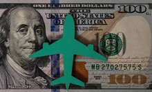 The Symbolic Figure Of An Airplane On A Bill Of Denomination Of 100 US Dollars