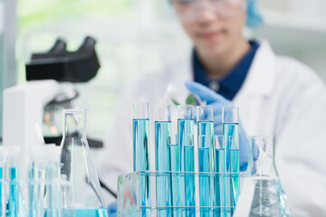Wall Mural - scientific flask glass or glassware equipment for using in pharmaceutical research in science chemis