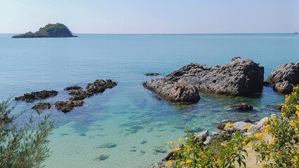 Rocks, sea and blue sky on a clear day