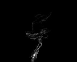 White smoke or steam smog moves on a black background. Beautiful gray smoke