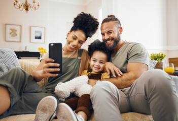 Poster - Interracial parents, child and selfie on sofa, smile and hug for love, bonding and memory on web blog. Mom, dad and kid for photography, profile picture and happy for social media app in family house