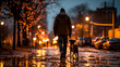 Man walking with a dog in the city at night.