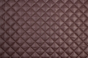  Fabric velour quilted close-up. Quilted surface upholstery