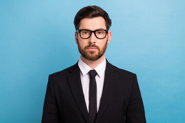 Sticker - Portrait of serious businessman young age bristle wear classic stylish new eyeglasses executive director isolated on blue color background