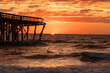 © John McAdorey - Sunrise over the Pawley's Island fishing Pier one week after half the pier was destroyed by Hurricane Ian
