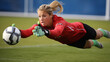 © Keitma - Professional woman football goalkeeper is diving to save the ball , women soccer concept