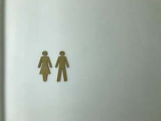 Golden Toilet sign on white background 