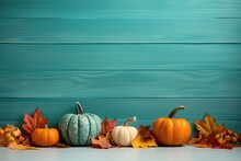 Autumn Colorful Pumkins On Light Blue Wooden Background. Harvest, Fall Time And Halloween Concept, Post Card, Copy Space.