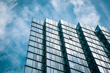 Wall Mural - architecture - city skyline skyscraper looking up with blue sky and clouds
