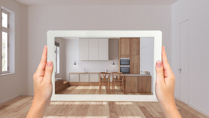 Wall Mural - augmented reality concept. hand holding tablet with ar application used to simulate furniture and de