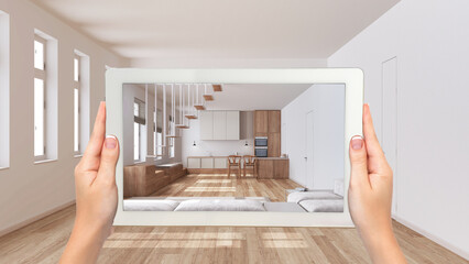 Wall Mural - augmented reality concept. hand holding tablet with ar application used to simulate furniture and de
