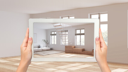Wall Mural - augmented reality concept. hand holding tablet with ar application used to simulate furniture and de