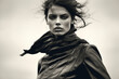 B&W portrait of fashion model in haute couture leather jacket and outfit. In the style of an on location magazine shoot.